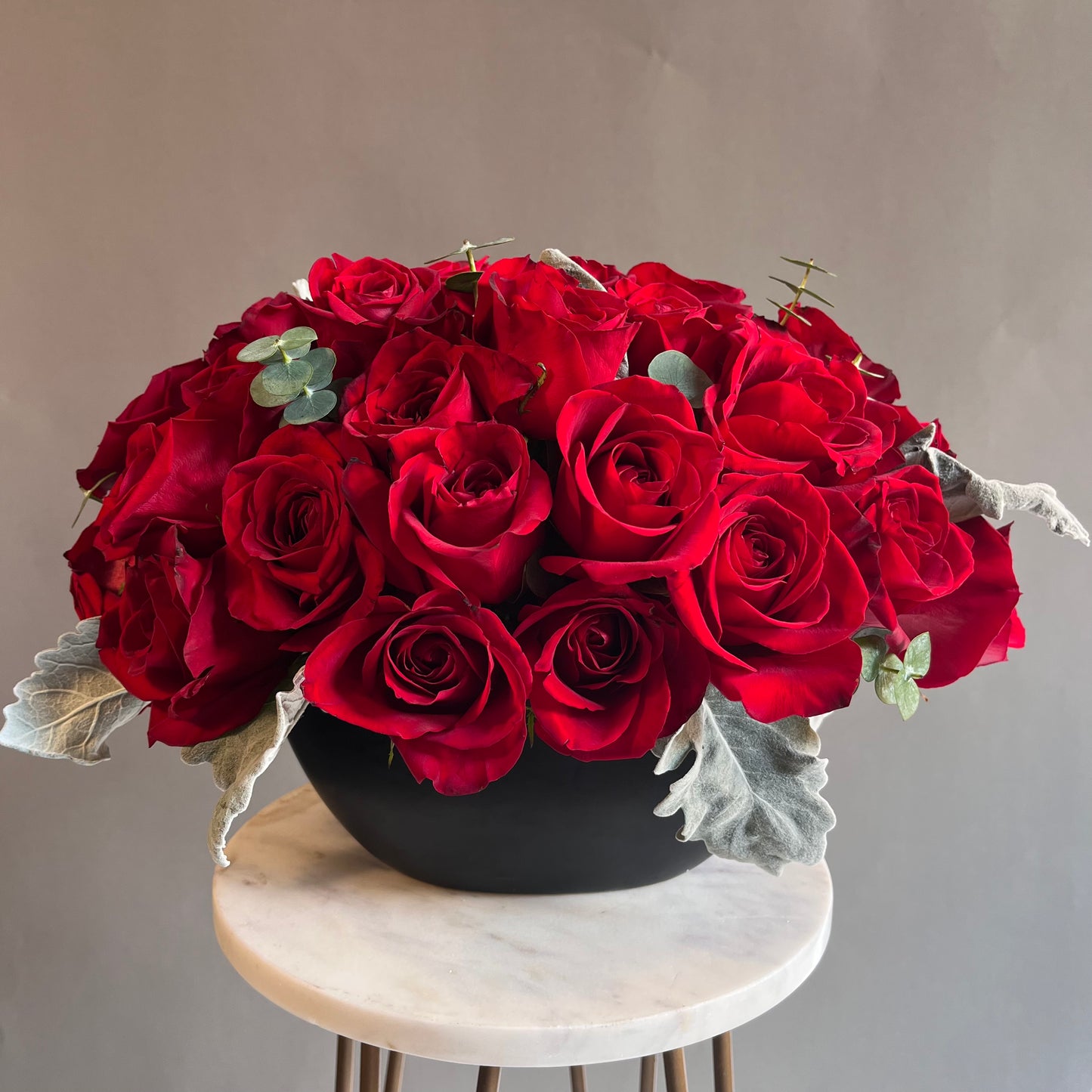 Red Roses in a Boat Vase