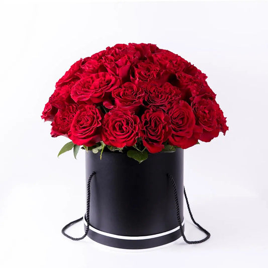 A wonderful bouquet of three dozen red roses in a black box